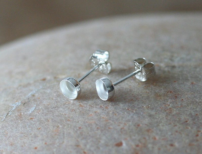 Post stud post earring blanks in sustainable sterling silver. Round bezel. Handmade in New Jersey, US.